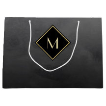 Elegantes Schwarz mit einfachem Goldmonogramm