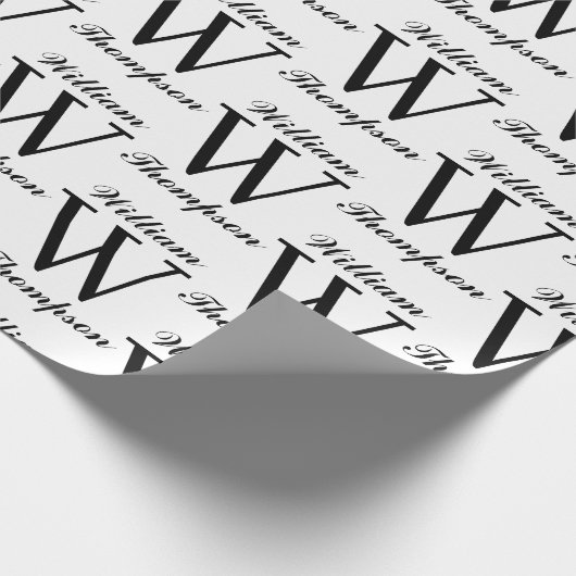 Elegantes Schwarz-Weiß-Script-Monogramm Geschenkpapier (Ecke)