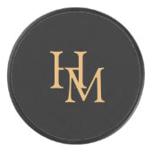 Elegantes schwarzes Puck mit goldener Monogrammbes (Vorderseite)