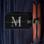 Elegantes, stylisches Schwarz-Grau-Monogramm-Initi Gepäckanhänger<br><div class="desc">Girly Stylish Moderne elegante Schwarz-Grau Monogram Initial Name Script Custom Personalisierte Personalisiert Luggage Bag Tag. Dieses Design mit einem Vornamen in einer hübschen Hand Schwanz-Schriftart-Kalligraphie (oder Typografie) mit Monogramm-Initial, Adresse-Info in grau und weiß auf schwarz. Diese sind einfach zu anpassen. Stilvolles Frauengeschenk für Hochzeit, Brautparty, 16 Geburtstag, Abschluss und für...</div>