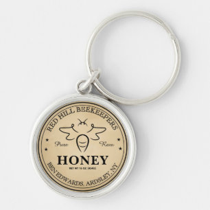 Elegantes vintage bearbeitbares Honigglas-Bienen-L Schlüsselanhänger