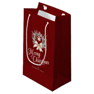 Elegantes Weihnachtsgesteck mit Schriftzug Kleine Geschenktüte