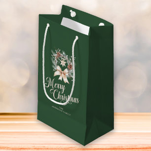 Elegantes Weihnachtsgruß-Schriftzug auf einem Weih Kleine Geschenktüte