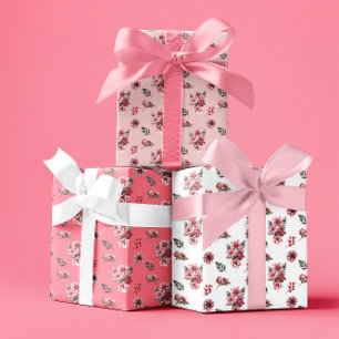 Elegantes Weihnachtsmuster mit rosa Weihnachtsster Geschenkpapier Set