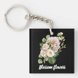 Elegantes weißes Blumenbouquet mit grünen Blättern Schlüsselanhänger