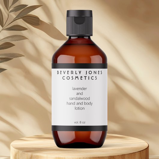 Elegantes weißes und schwarzes Grenzkosmetiketiket