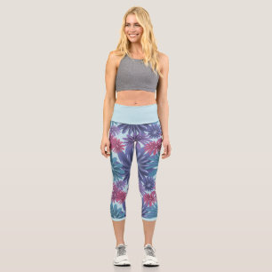 Elektrische Blüte: Glänzendes Blau und Rosa floral Capri Leggings