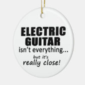 Elektrische Gitarre ist nicht alles Keramikornament (Links)