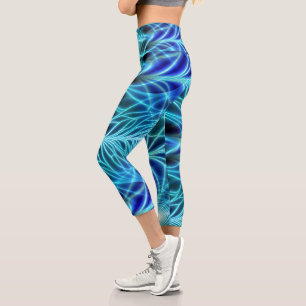 Elektrisches blaues leuchtendes Fraktal Wiederholu Capri Leggings