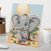 Elephant Baby Jumping Happy in African Savannah Sockelschild (In Situ)