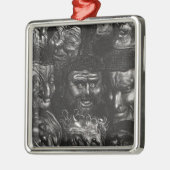 Elf groteske Gesichter Silbernes Ornament (Links)