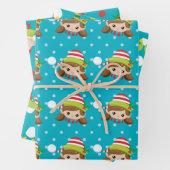 Elf-Junge-Mädchen steht auf blau mit Schneemuster Geschenkpapier Set (Beispiel)
