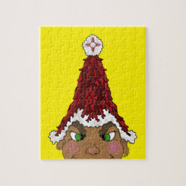 Elf mit einer Weihnachtsmannmütze aus einem Roten  Puzzle