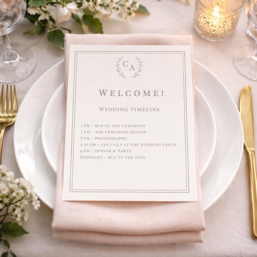 Elfenbeinfarbenes Hochzeitsprogramm mit Monogramm