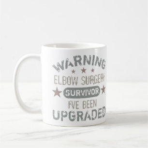 Ellbogen-Operations-Humor aufgerüstet Kaffeetasse