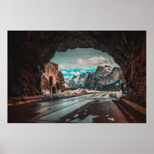 EMPTY ROAD TUNNEL LEADING TO MOUNTAINS POSTER