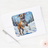 Energetic Boxer Dog Leaping in Winter Snow Fun Quadratischer Aufkleber (Umschlag)