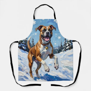 Energischer Boxerhund springt im Winterschnee Spaß Schürze