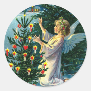 Engel schmückt Weihnachtsbaum 2 Runder Aufkleber