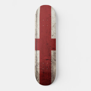England-Flagge auf altem hölzernem Korn Skateboard