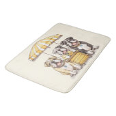 Englische Bullhunde laufen auf einer Limonade Badematte (Schrägansicht)