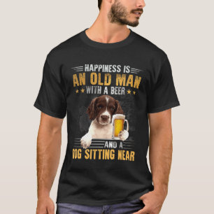 Englischer Springer Spaniel Alter Mann mit einem H T-Shirt