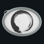 Enso Zen Circle Ovale Gürtelschnalle<br><div class="desc">Zen Spirit & Enso,  Zen Circles. Enso ist ein japanisches Wort,  das "Kreis" bedeutet,  und ein Begriff,  das eng mit Zen verbunden ist. Es symbolisiert das Absolute,  die Erleuchtung,  die Kraft,  die Eleganz,  das Universum und das Leere; es kann auch die japanische Ästhetik selbst symbolisieren.</div>