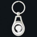 Enso Zen Circle Schlüsselanhänger<br><div class="desc">Zen Spirit & Enso,  Zen Circles. Enso ist ein japanisches Wort,  das "Kreis" bedeutet,  und ein Begriff,  das eng mit Zen verbunden ist. Es symbolisiert das Absolute,  die Erleuchtung,  die Kraft,  die Eleganz,  das Universum und das Leere; es kann auch die japanische Ästhetik selbst symbolisieren.</div>