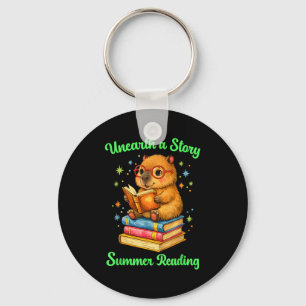 Entdecke eine Geschichte Capybara liest Bücher Som Schlüsselanhänger