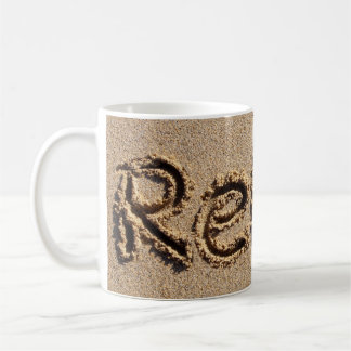 Entspannen Sie sich in der Tasse des Beach Sand Fo