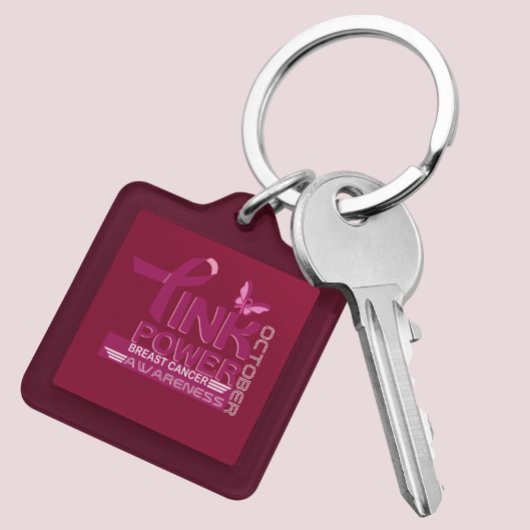 Entwurf des Bewusstseins für den rosa Power-Brustk Schlüsselanhänger