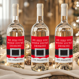 Er sieht dich, wenn du Weihnachten trinkst Weinetikett