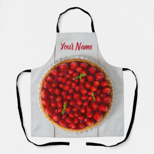 Erdbeerkuchen mit Minze aus weißem Holz Schürze