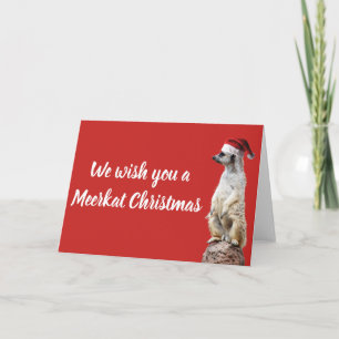 Erdmännchen in einem Weihnachtsmannhut Feiertagskarte