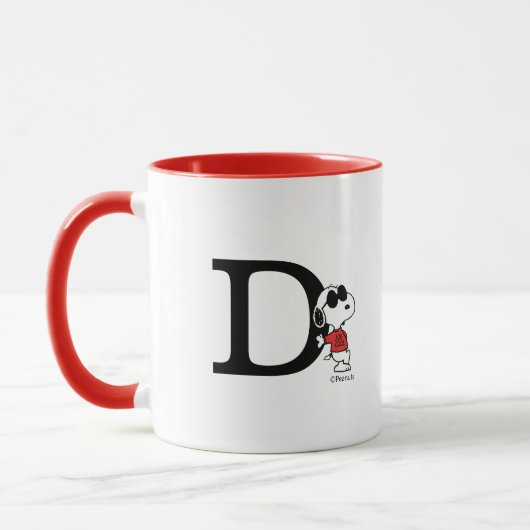 Erdnüsse | "Joe Cool" Stehend | Monogramm D Tasse (Links)