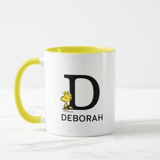 Erdnüsse | Name des Holzbestands und Monogramm D Tasse (Links)