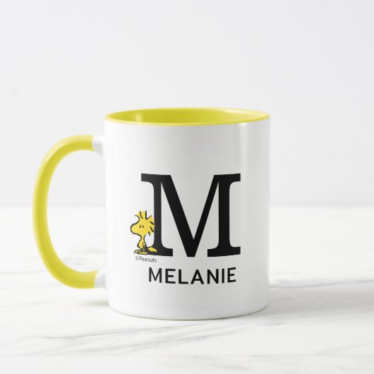 Erdnüsse | Name des Holzbestands und Monogramm M Tasse (Links)