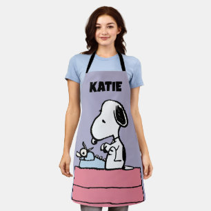 Erdnüsse Snoopy an der Schreibmaschine Füge De Schürze