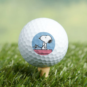 Erdnüsse Snoopy bei der Schreibmaschine Golfball