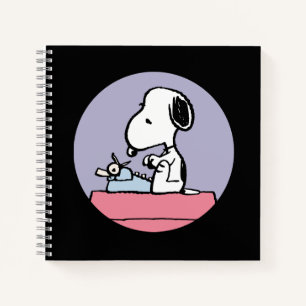 Erdnüsse Snoopy bei der Schreibmaschine Notizblock