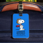 Erdnüsse | Snoopy the Fliegerace Gepäckanhänger<br><div class="desc">Reisen Sie mit diesem Peanuts Snoopy die Flying Ace Gepäckmarke. Mit Snoopy als seiner berühmten Ass-Persönlichkeit aus dem Ersten Weltkrieg ist dieser Anhänger sowohl funktional als auch unterhaltsam und eignet sich ideal, um Ihre Reiseausrüstung mit einer spielerischen Touch zu versehen. Als Muss-Accessoire für Peanuts-Fans hilft es Ihnen, Ihr Gepäck leicht...</div>
