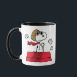 Erdnüsse | Snoopy the Flying Ace Tasse<br><div class="desc">Dieses niedliche Peanuts-Design zeigt Snoopy als Ass-Lektüre des Ersten Weltkriegs,  um den Roten Baron von Deutschland zu übernehmen.</div>