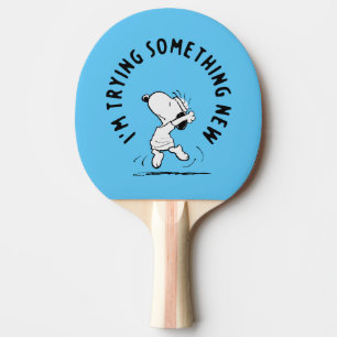 Erdnüsse Snoopy versucht etwas Neues Tischtennis Schläger