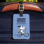 Erdnüsse | Snoopy & Woodstock Fahrrad Gepäckanhänger<br><div class="desc">Karo in diesem phantastischen Erdnussdesign mit Snoopy und Woodstock.</div>