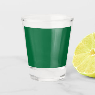 Erhöhen Sie Ihr Webdesign mit einem grünen Hinterg Schnapsglas