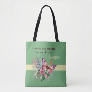 Ermutigungsschmetterling und Blumen auf Grün Tasche