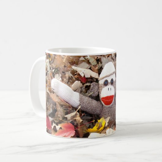 Ernie der Socken-Affe-Herbst verlässt Tasse (Vorderseite Links)