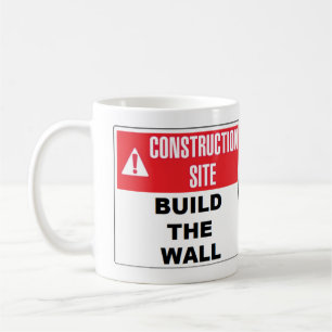 "Errichten Sie die Wand-" Tasse