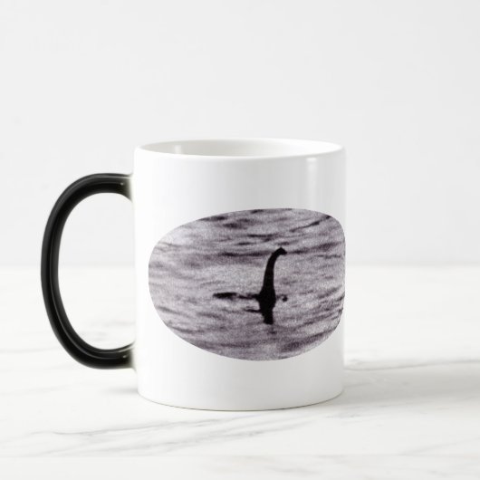 Erscheinende/verschwindene Nessie-Tasse Verwandlungstasse (Links)
