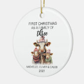 Erste Weihnachtskuhfamilie von drei Keramik Ornament (Links)